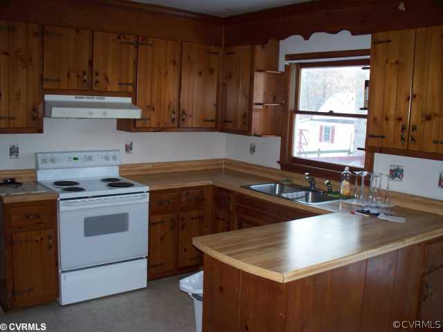 4700 Brookridge Road Chesterfield, VA 23832 - Photo 7 of 8 a kitchen with sink cabinets and window