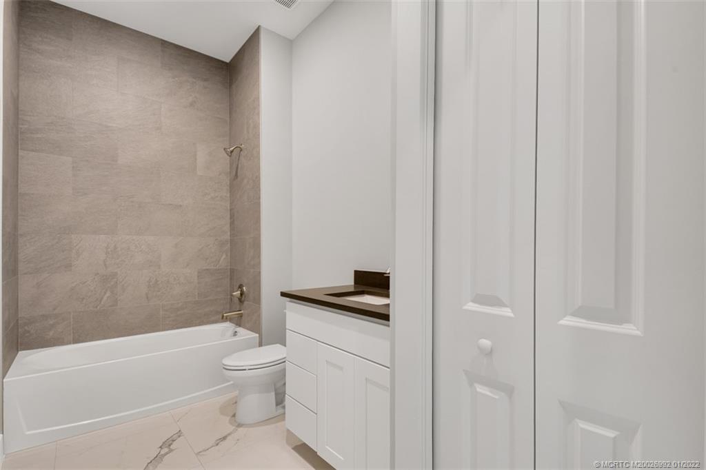 2161 Southwest Oasis Terrace Stuart, FL 34997 - Photo 44 of 72 Bathroom 3