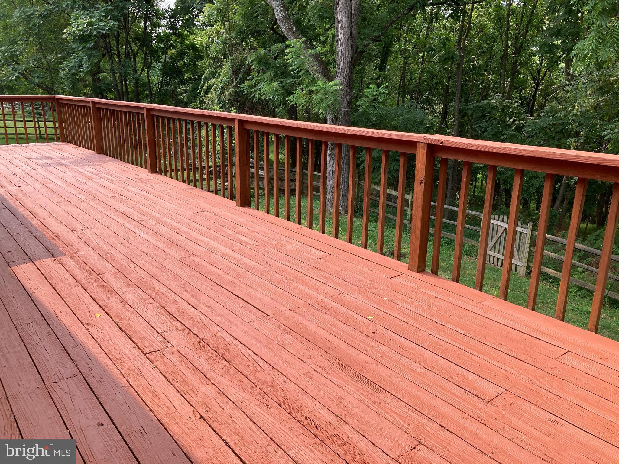 6916 Fox Chase Road New Market, MD 21774 - Photo 13 of 43 Large deck spans length of house.