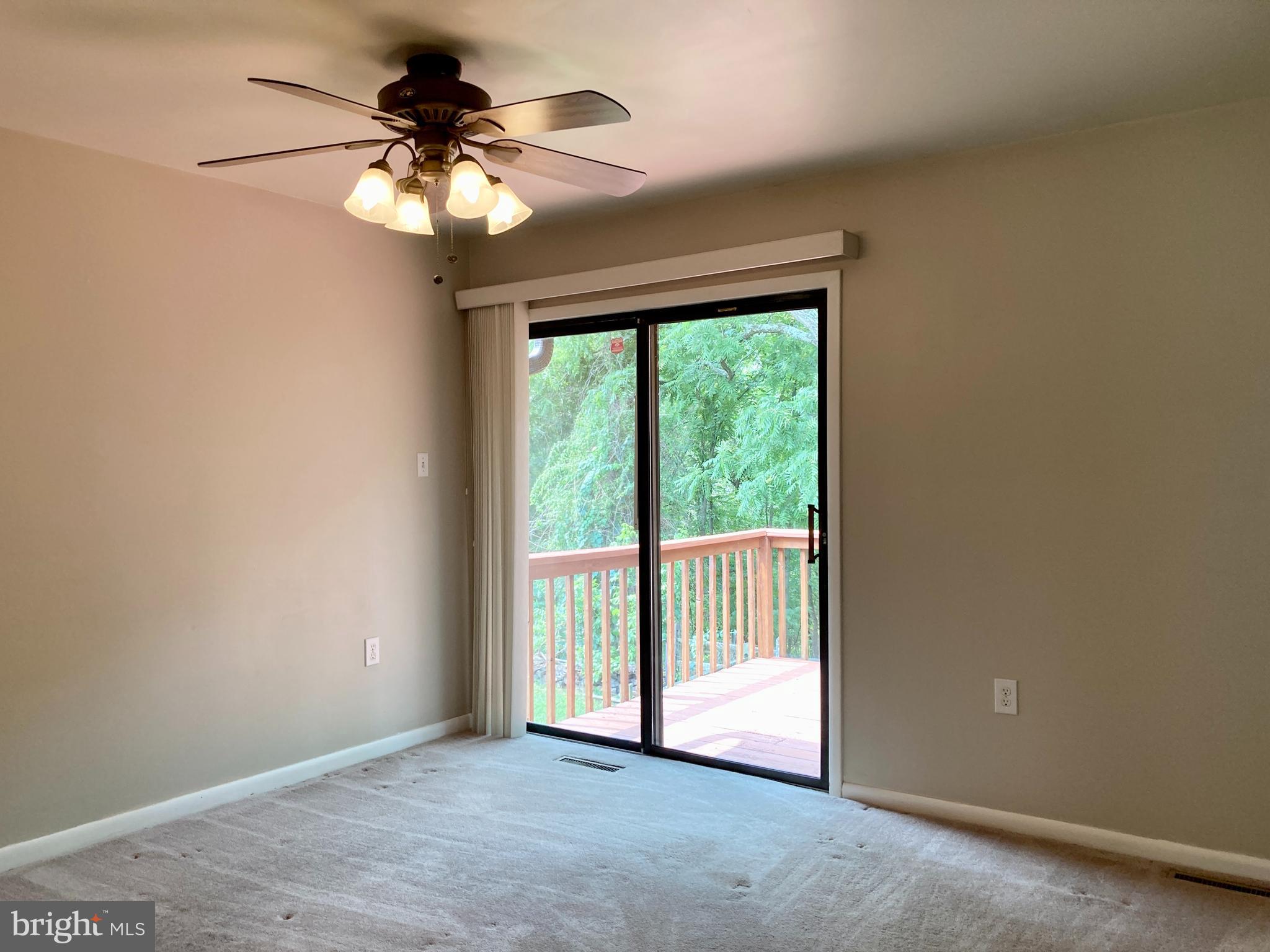 6916 Fox Chase Road New Market, MD 21774 - Photo 14 of 43 Primary bedroom with deck access.