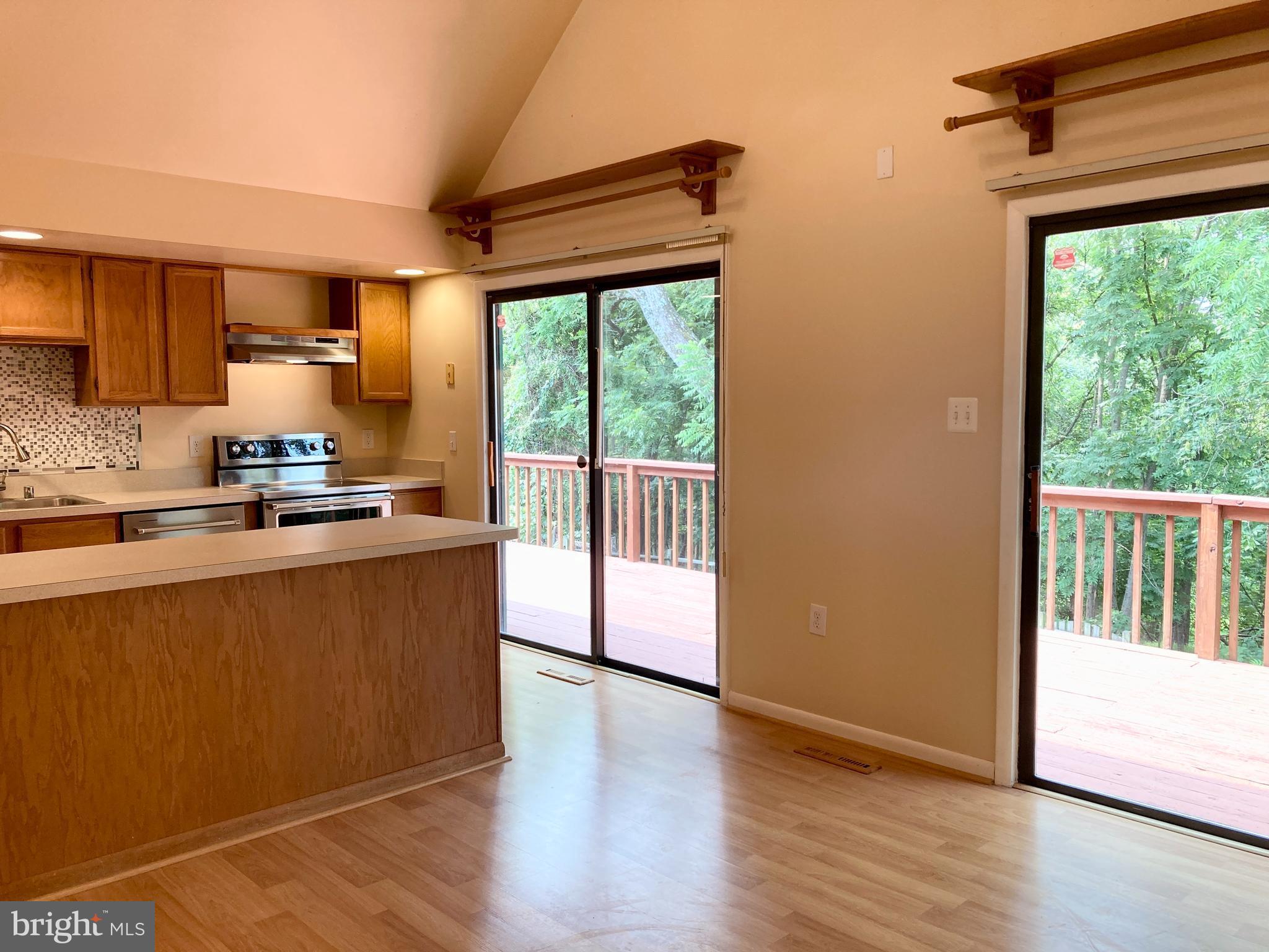 6916 Fox Chase Road New Market, MD 21774 - Photo 8 of 43 Kitchen and dining opens to deck.