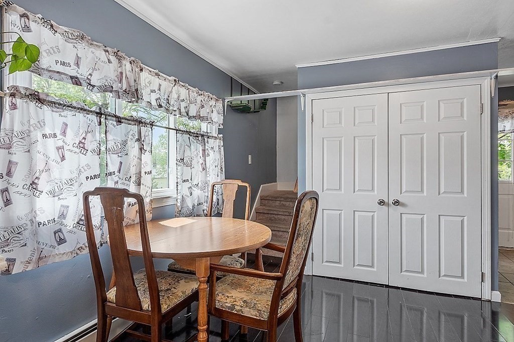 84 Euclid Street Gardner, MA 01440 - Photo 13 of 28 a view of a dining room with furniture and wooden floor