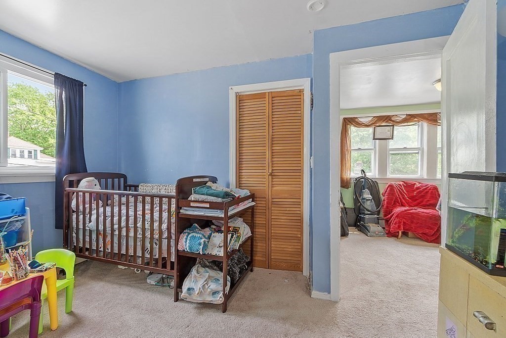 84 Euclid Street Gardner, MA 01440 - Photo 19 of 28 a bedroom with furniture and a window