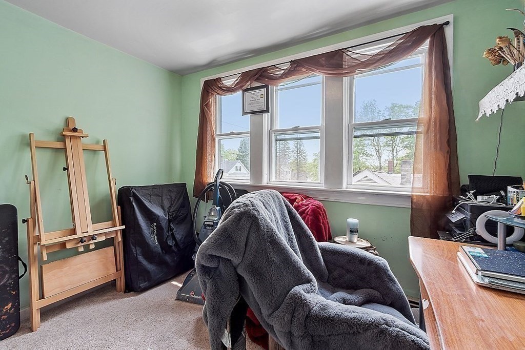 84 Euclid Street Gardner, MA 01440 - Photo 26 of 28 a living room with furniture and a window