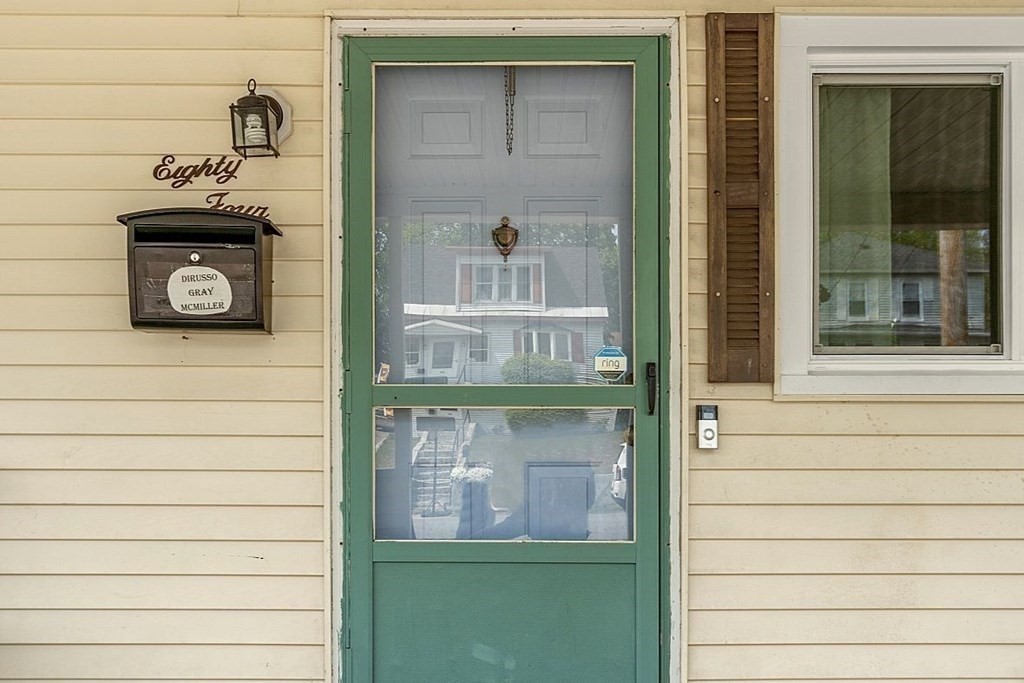 84 Euclid Street Gardner, MA 01440 - Photo 3 of 28 a bathroom with a sink and a mirror