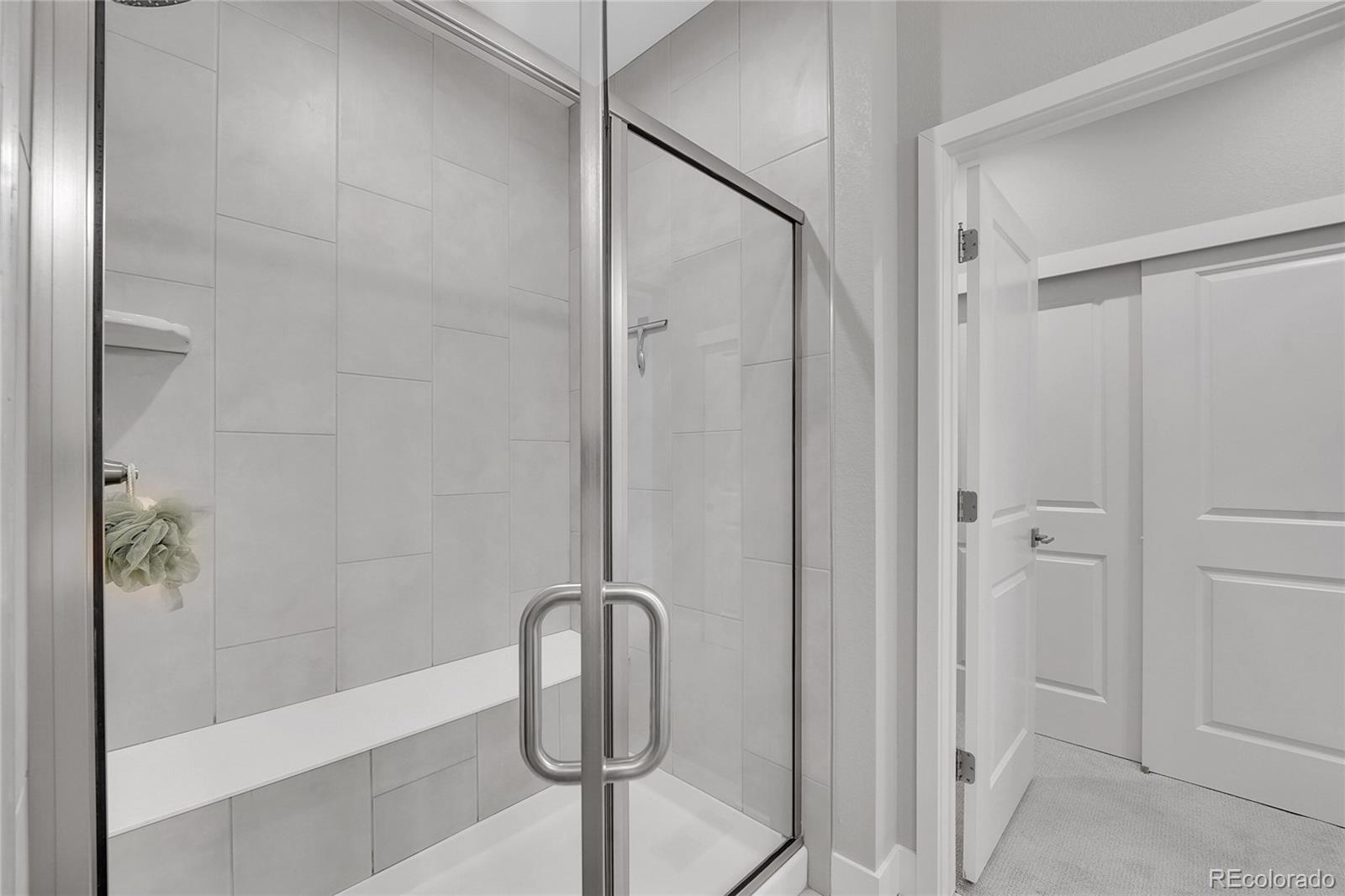 6211 West 28th Avenue Wheat Ridge, CO 80214 - Photo 25 of 29 a bathroom with a shower