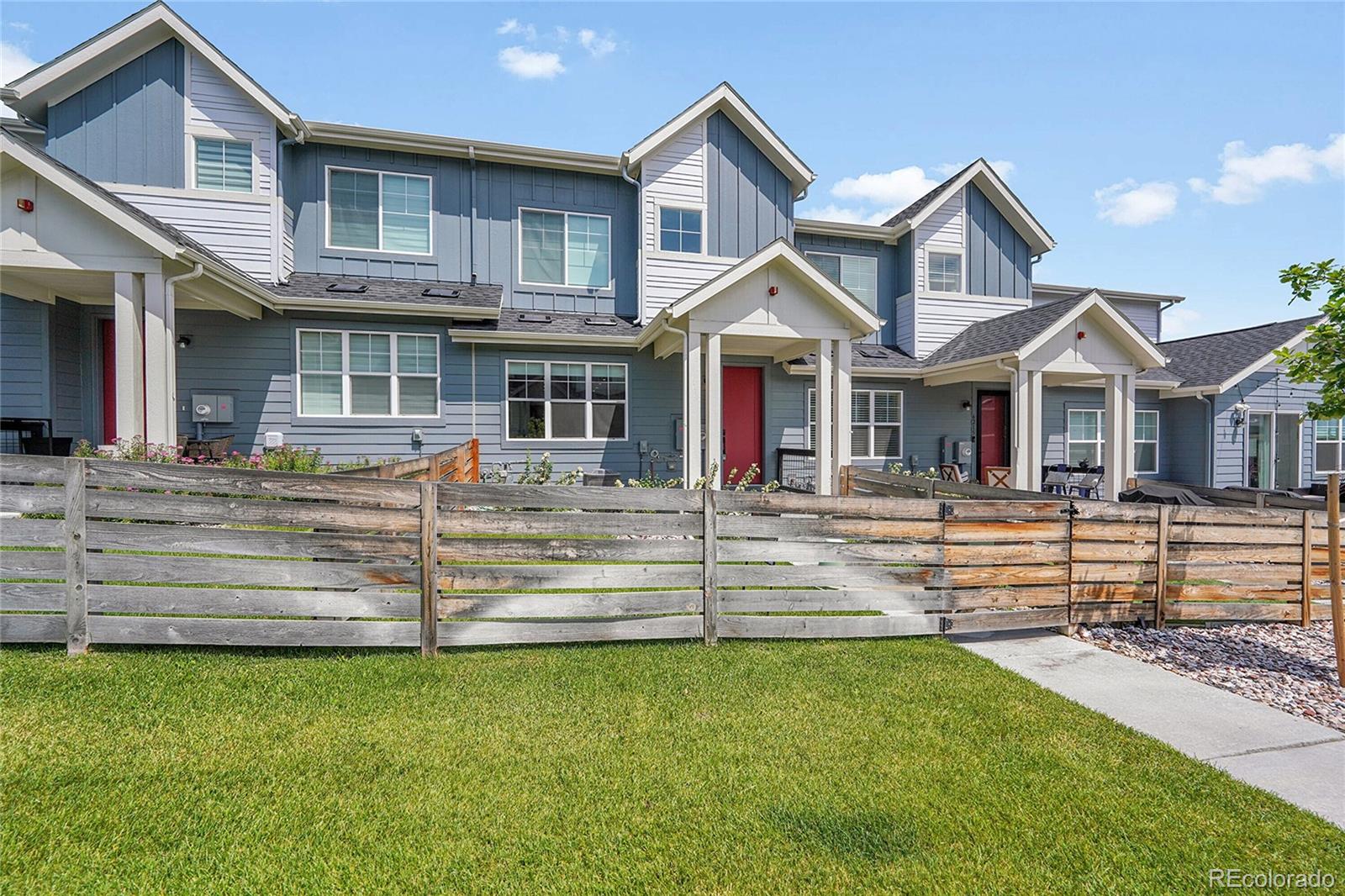 6211 West 28th Avenue Wheat Ridge, CO 80214 - Photo 28 of 29 a front view of a house with a porch