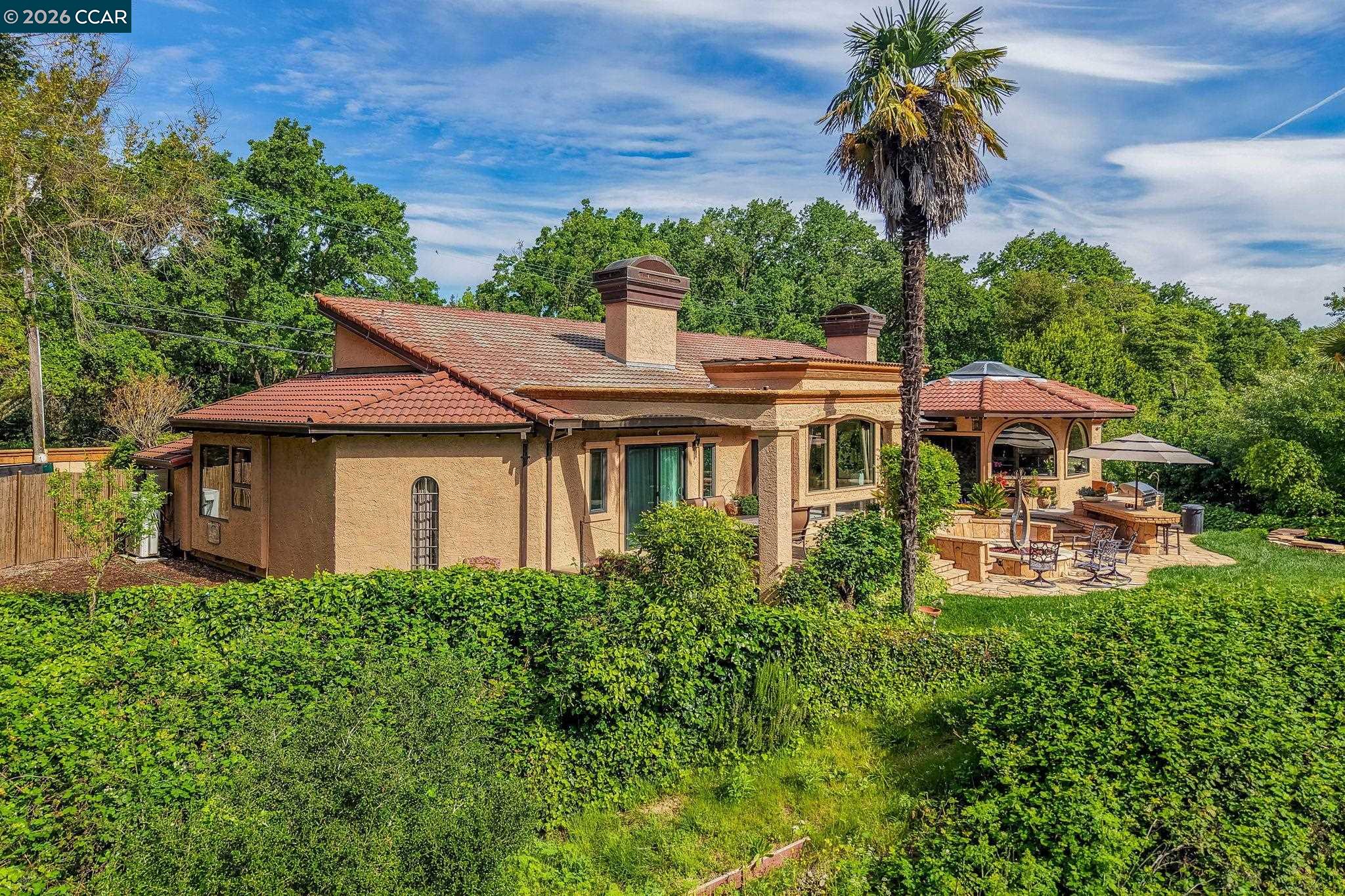 490 St Marys Road Lafayette, CA 94549 - Photo 5 of 61 a aerial view of a house with a yard and potted plants