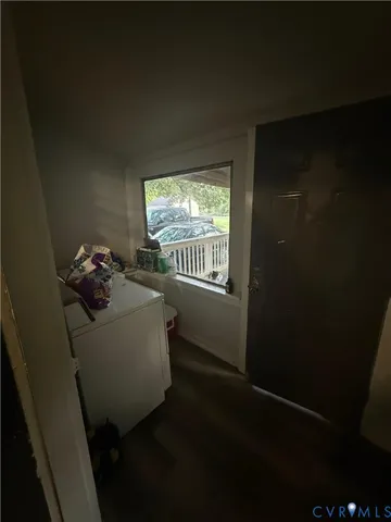 a room with furniture and a window