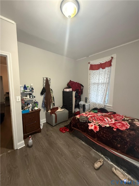 2714 Alexander Avenue Richmond, VA 23234 - Photo 6 of 15 a bedroom with bed and window