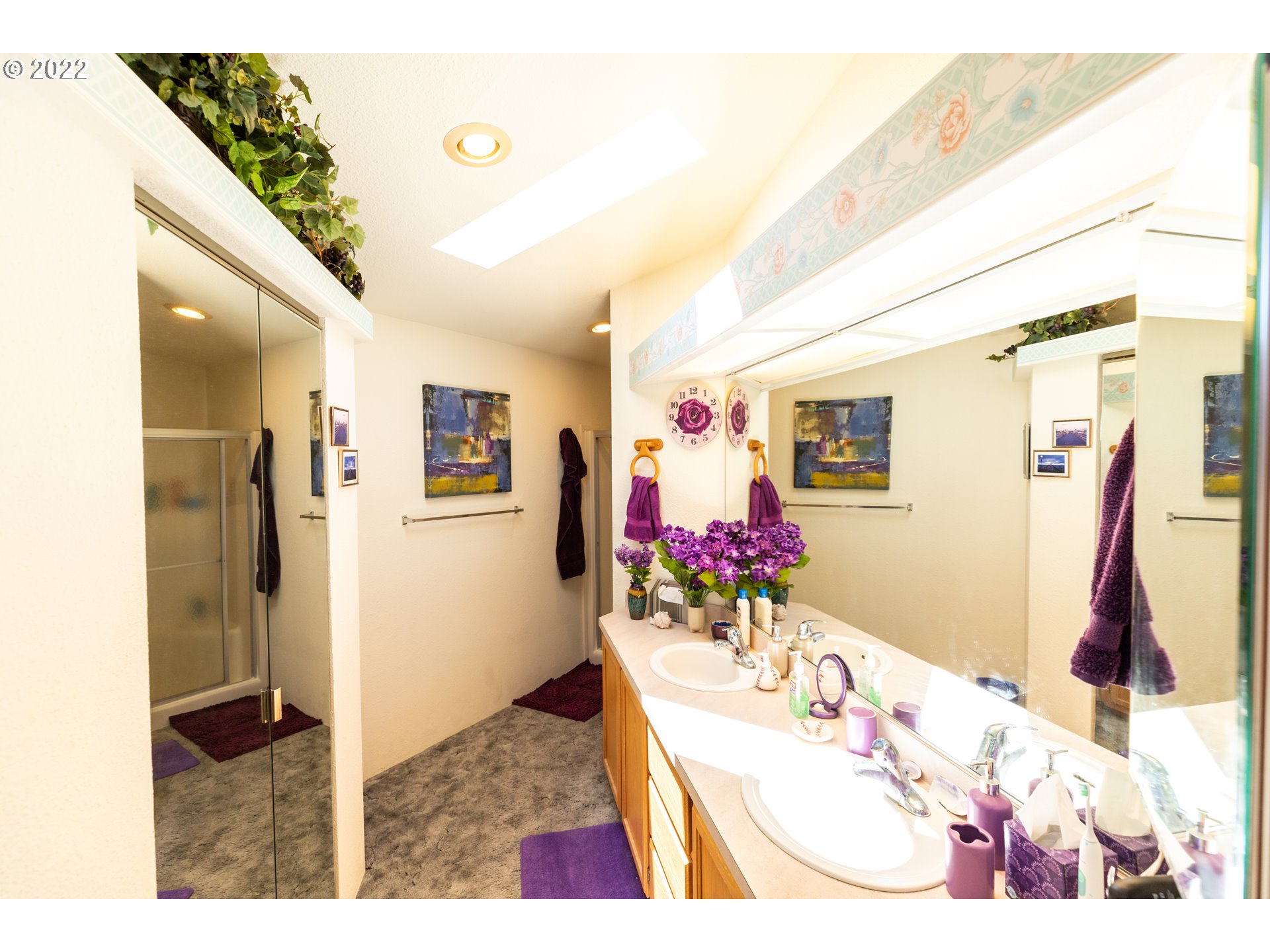 100 River Bend Road, Unit 116 Reedsport, OR 97467 - Photo 27 of 32 a bathroom with a sink mirror and shower