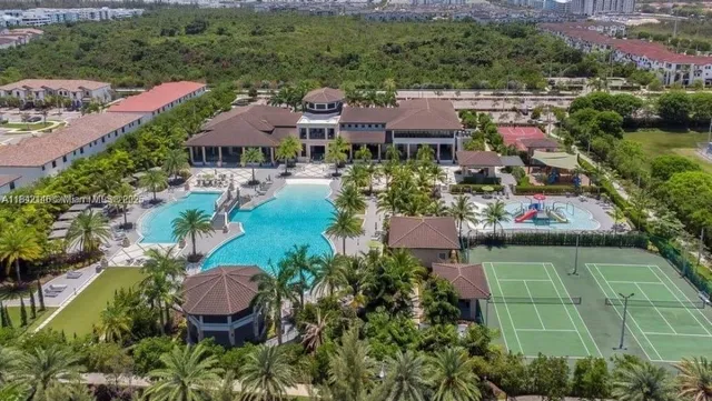 an aerial view of residential houses and outdoor space