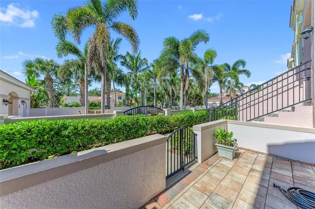 a view of a garden and a fountain