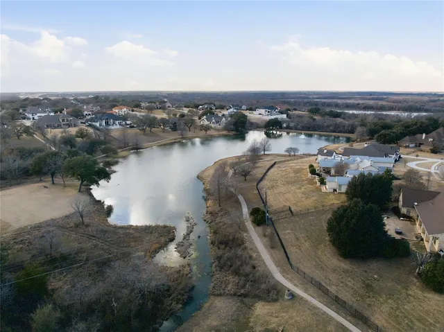 an aerial view of a house with outdoor space