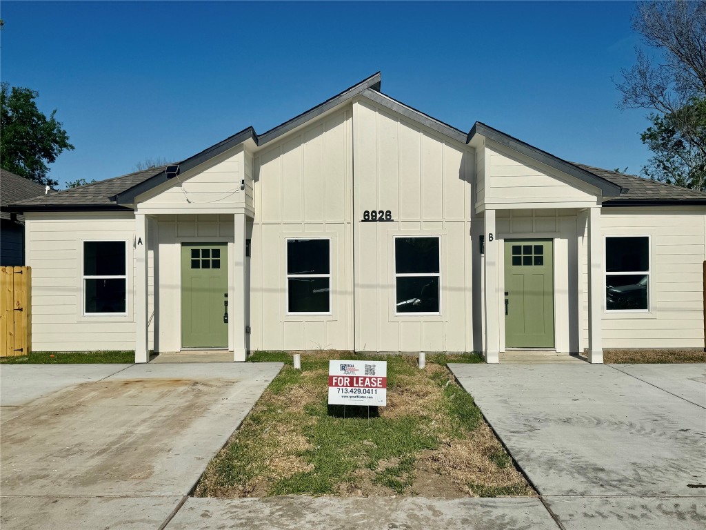 a view of a house with a garden