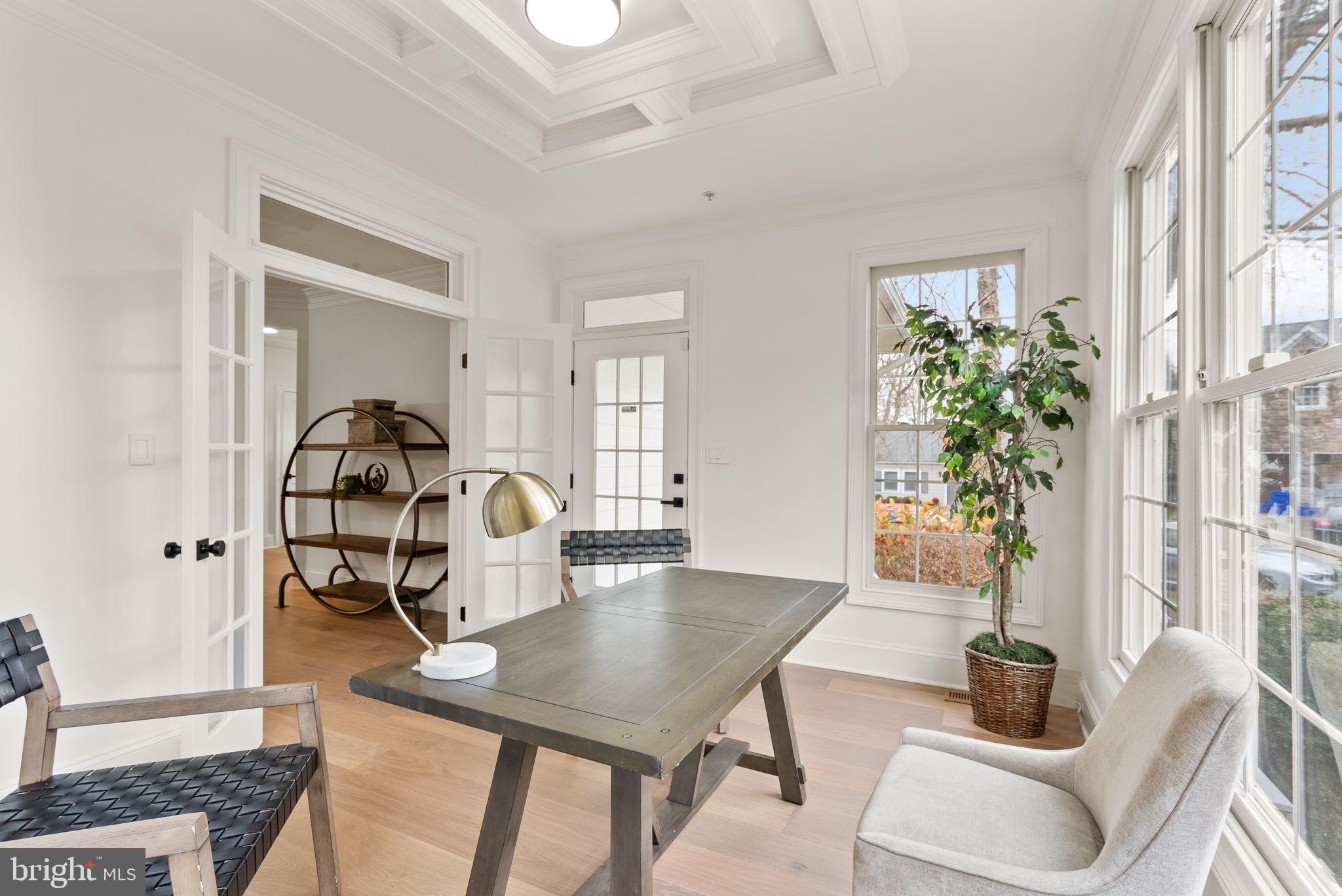 3336 Jones Bridge Court Chevy Chase, MD 20815 - Photo 26 of 99 a living room with furniture and wooden floor