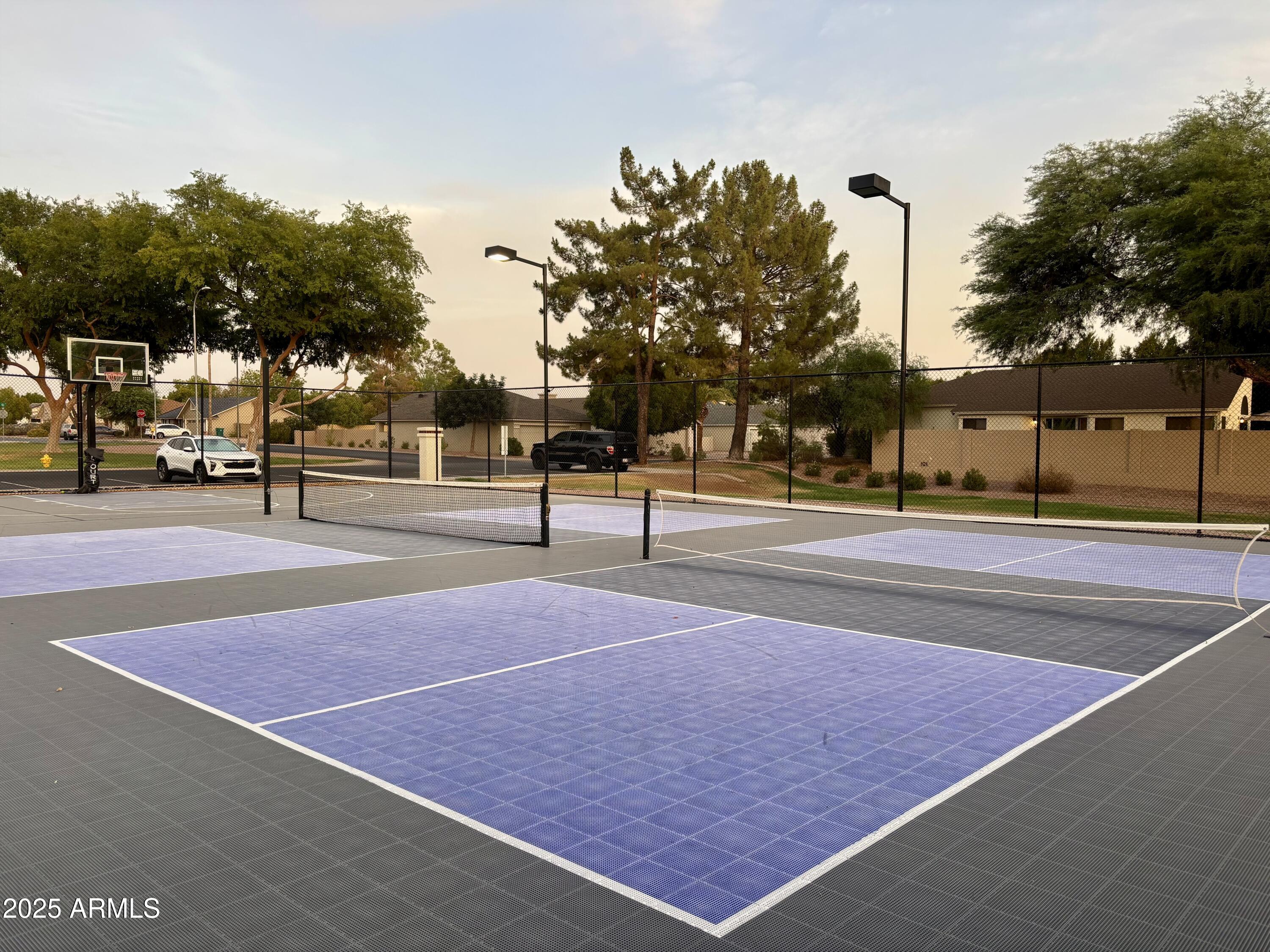 4725 East Brown Road, Unit 57 Mesa, AZ 85205 - Photo 14 of 14 a view of a tennis court