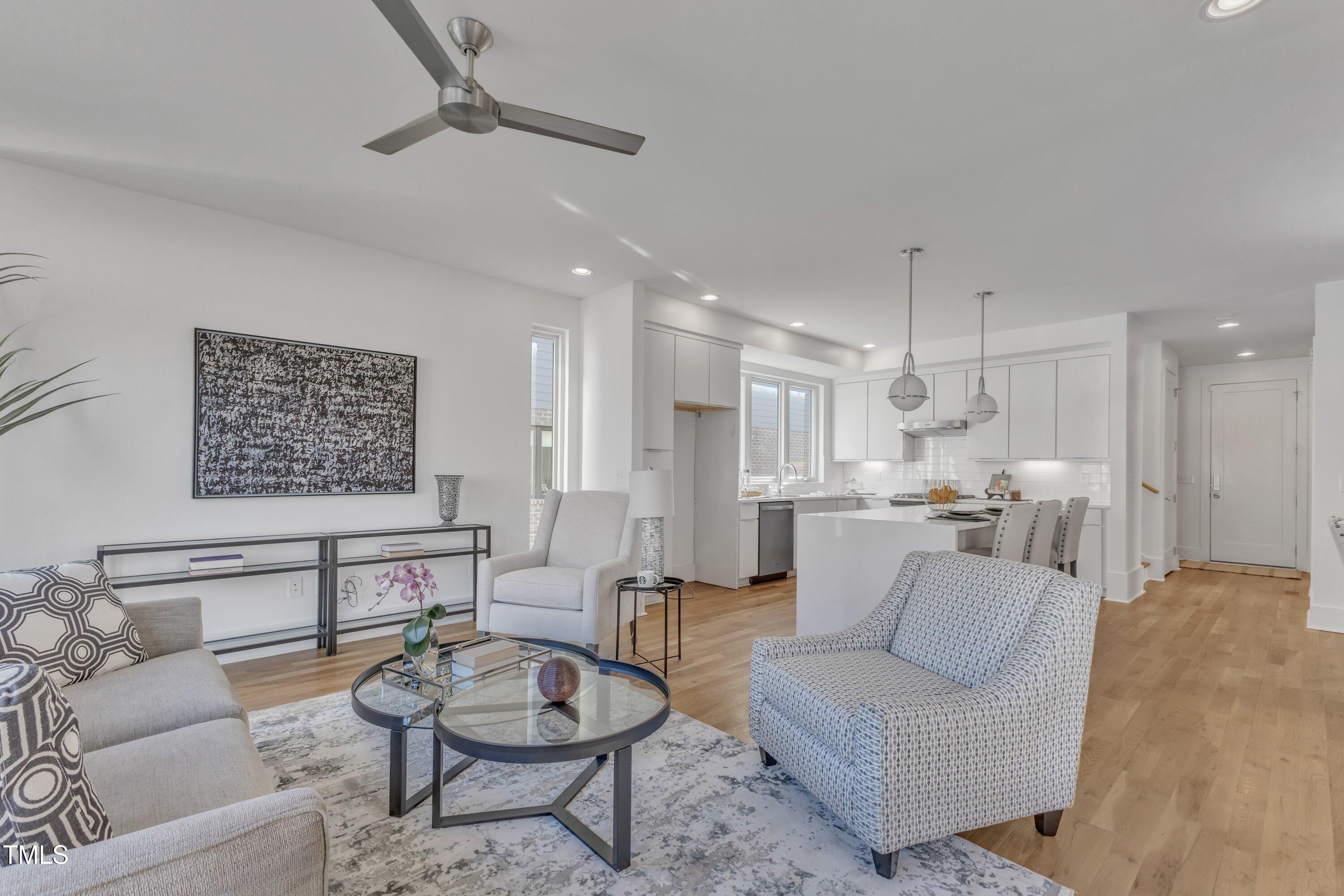 524 East Edenton Street Raleigh, NC 27601 - Photo 20 of 70 a living room with furniture and kitchen view