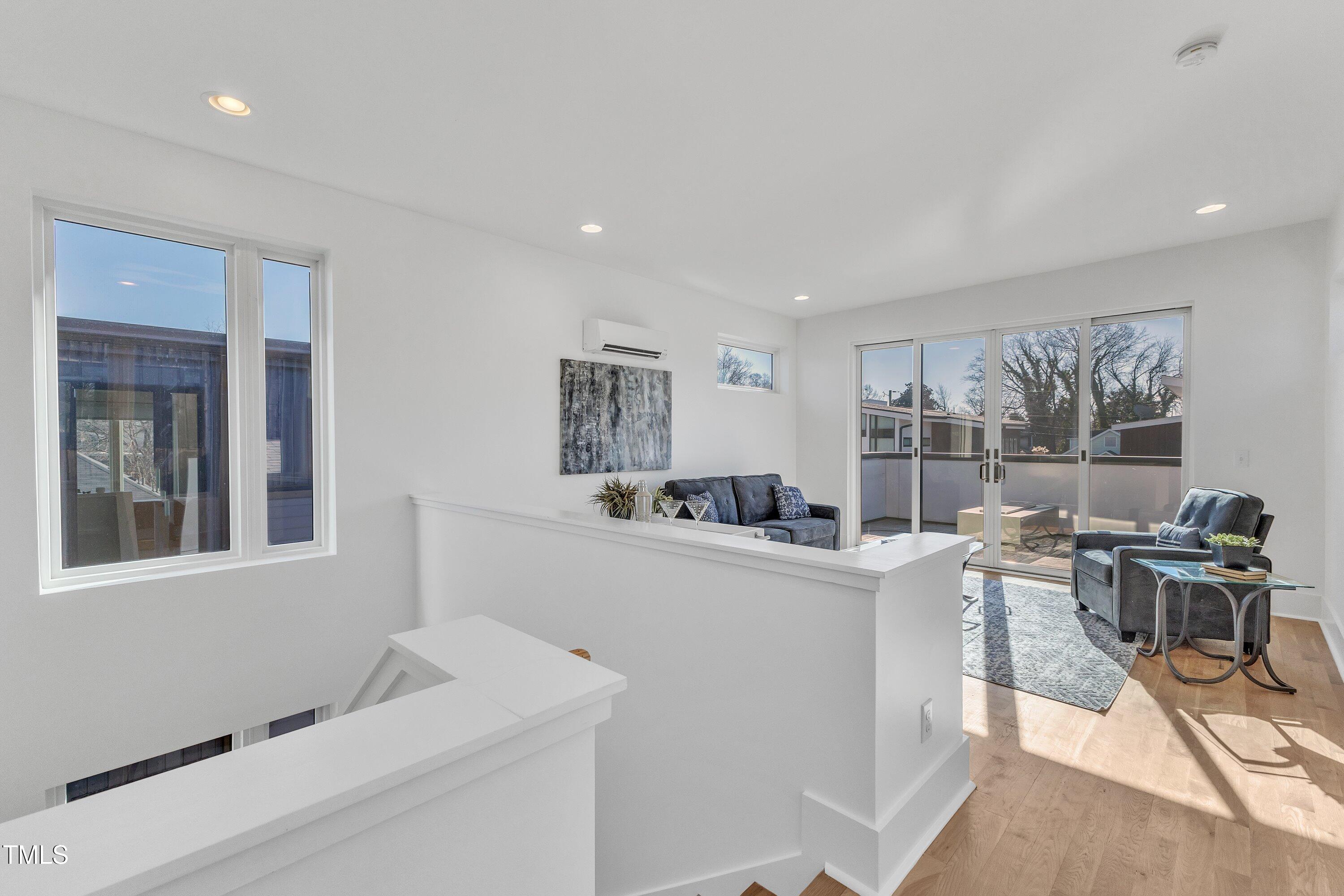 524 East Edenton Street Raleigh, NC 27601 - Photo 44 of 70 a view of a room with workspace and windows
