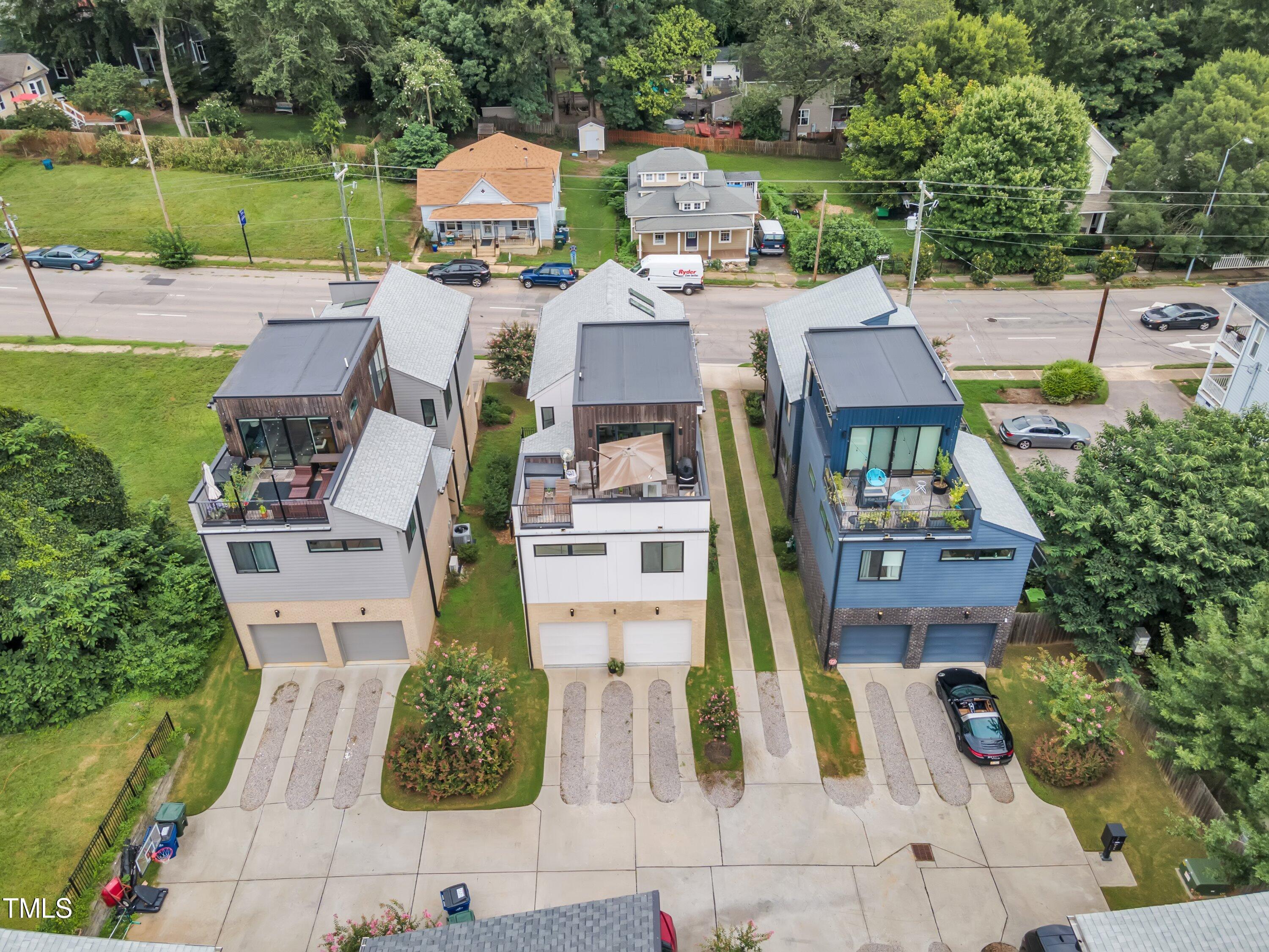 524 East Edenton Street Raleigh, NC 27601 - Photo 5 of 70 an aerial view of a house with garden space and street view
