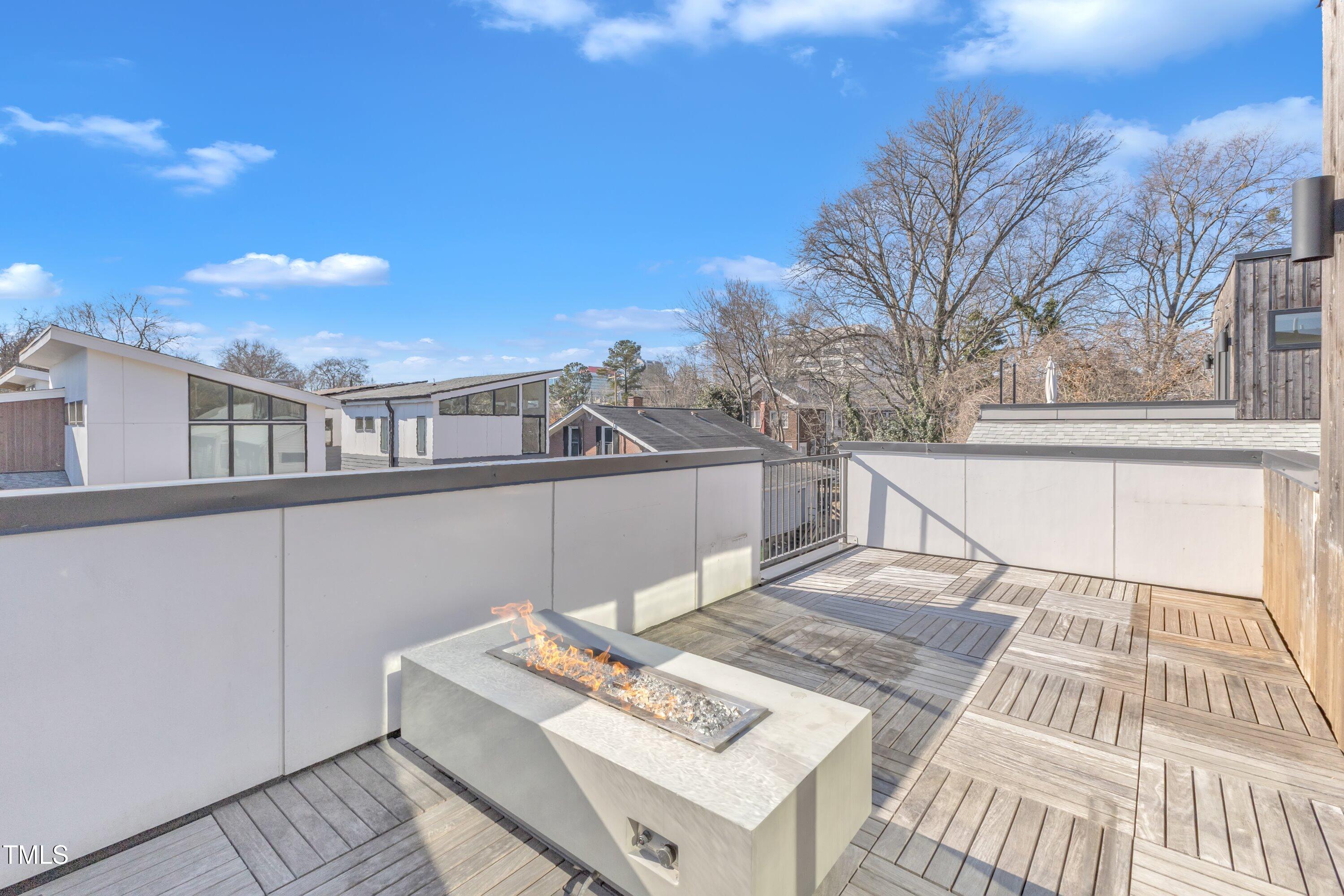 524 East Edenton Street Raleigh, NC 27601 - Photo 51 of 70 a view of a terrace with a bench