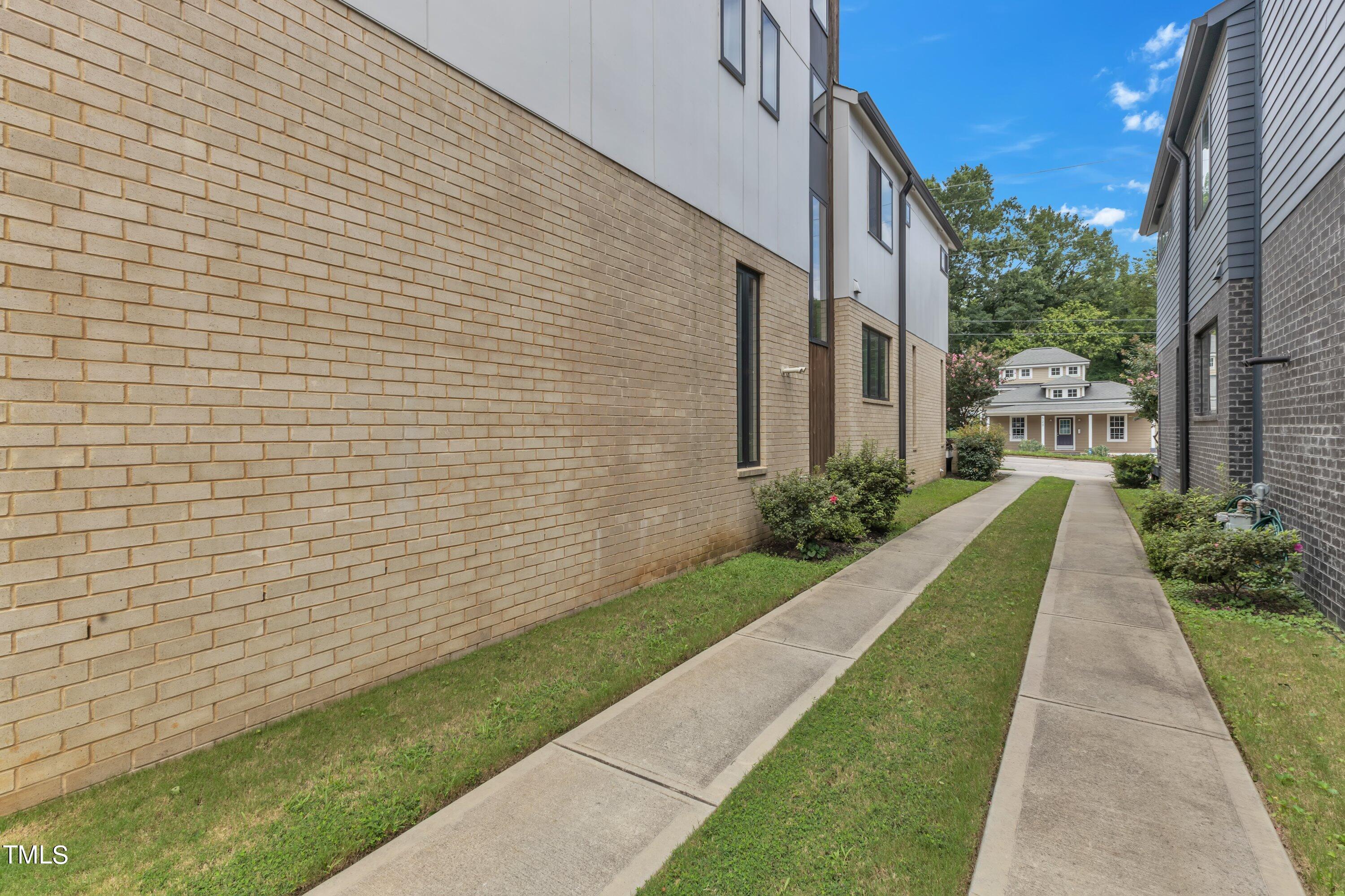 524 East Edenton Street Raleigh, NC 27601 - Photo 60 of 70 a view of a backyard with potted plants