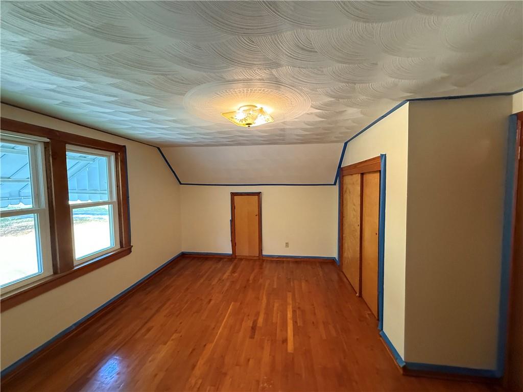 3948 Piney Dam Road Clarion, PA 16214 - Photo 10 of 23 a view of empty room with wooden floor and fan