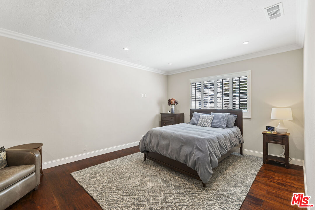 38 Inverness Road Thousand Oaks, CA 91361 - Photo 33 of 42 a bedroom with a bed and a couch