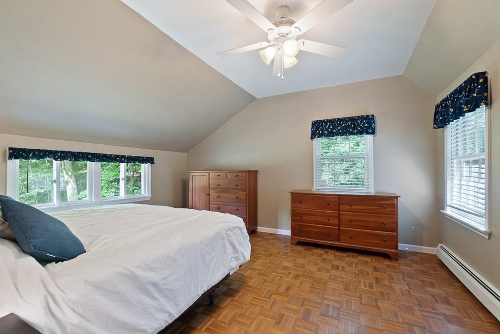 94 Wheeler Road Princeton, MA 01541 - Photo 27 of 40 a bedroom with a bed and a window