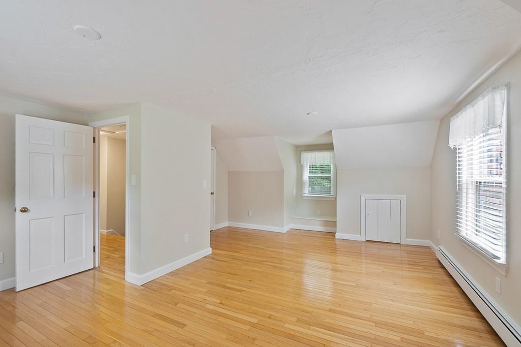 94 Wheeler Road Princeton, MA 01541 - Photo 29 of 40 a view of empty room with wooden floor and fan