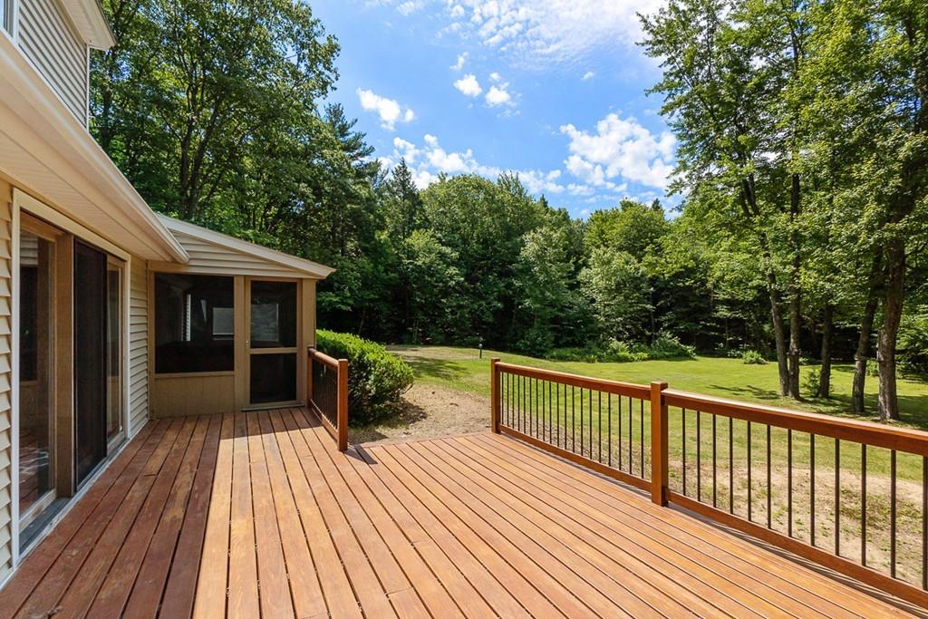 94 Wheeler Road Princeton, MA 01541 - Photo 4 of 40 a view of balcony with deck and wooden floor
