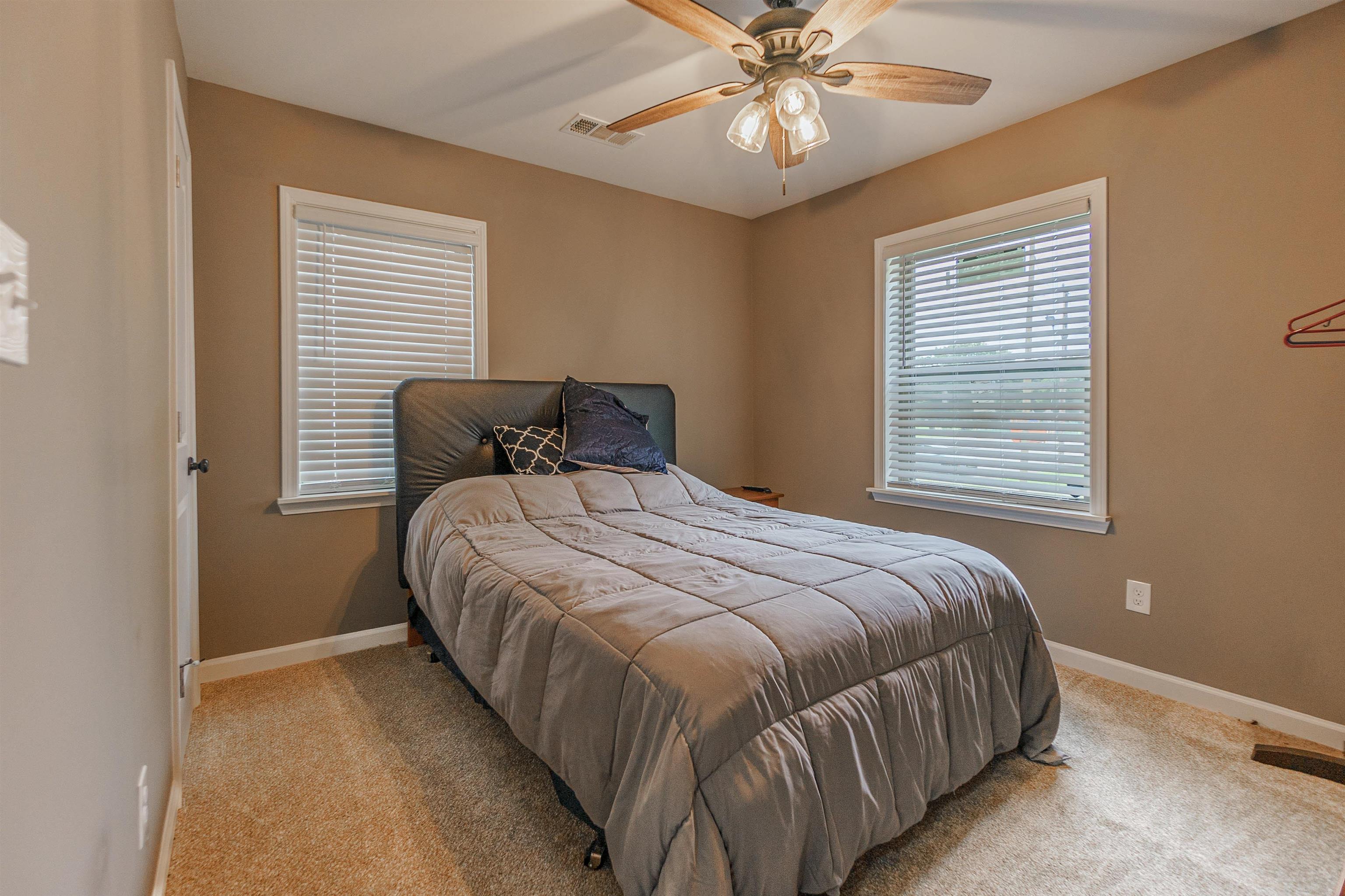3718 Vanuys Road Memphis, TN 38111 - Photo 12 of 20 a bedroom with a bed and window