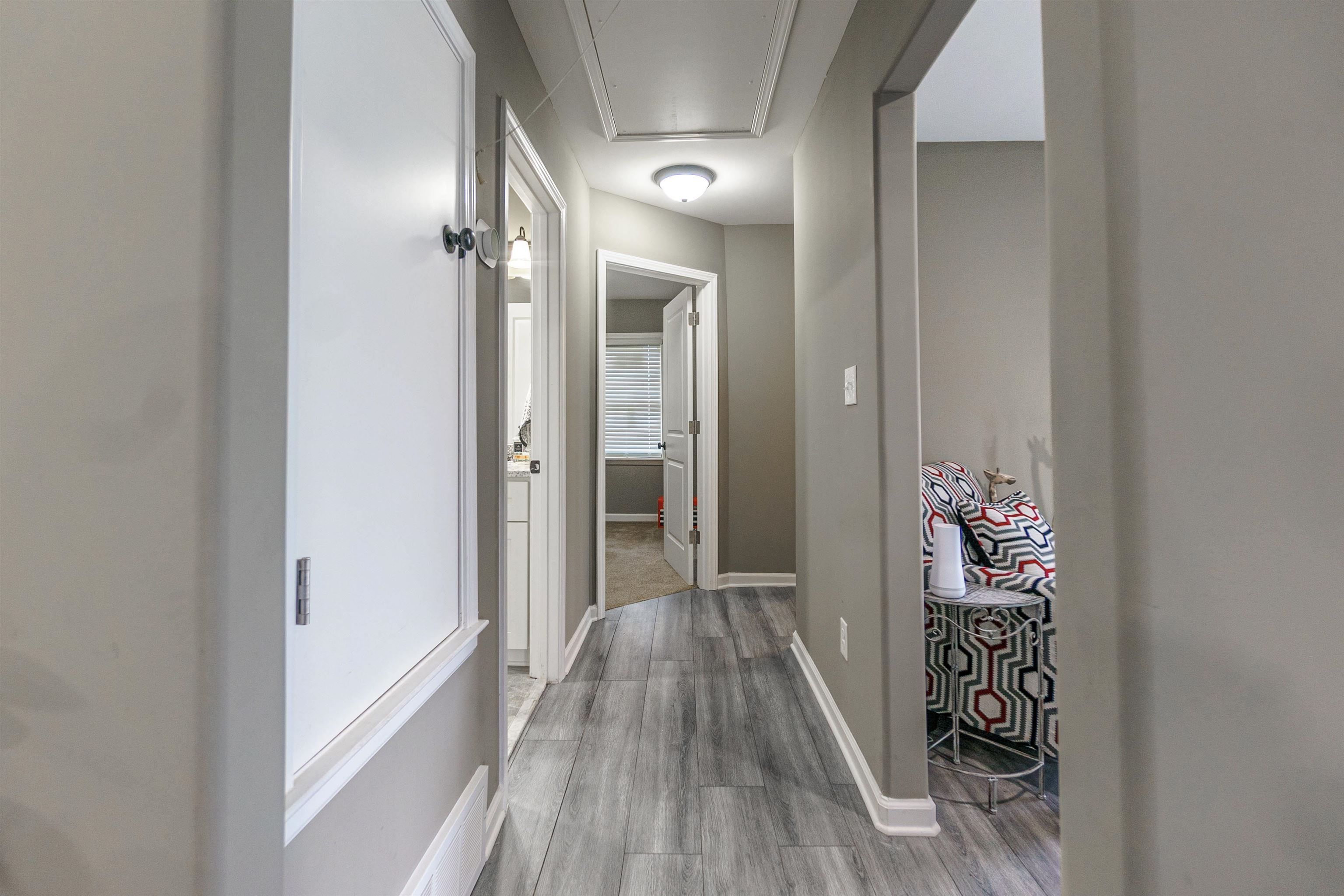3718 Vanuys Road Memphis, TN 38111 - Photo 14 of 20 a view of a hallway with wooden floor and closet