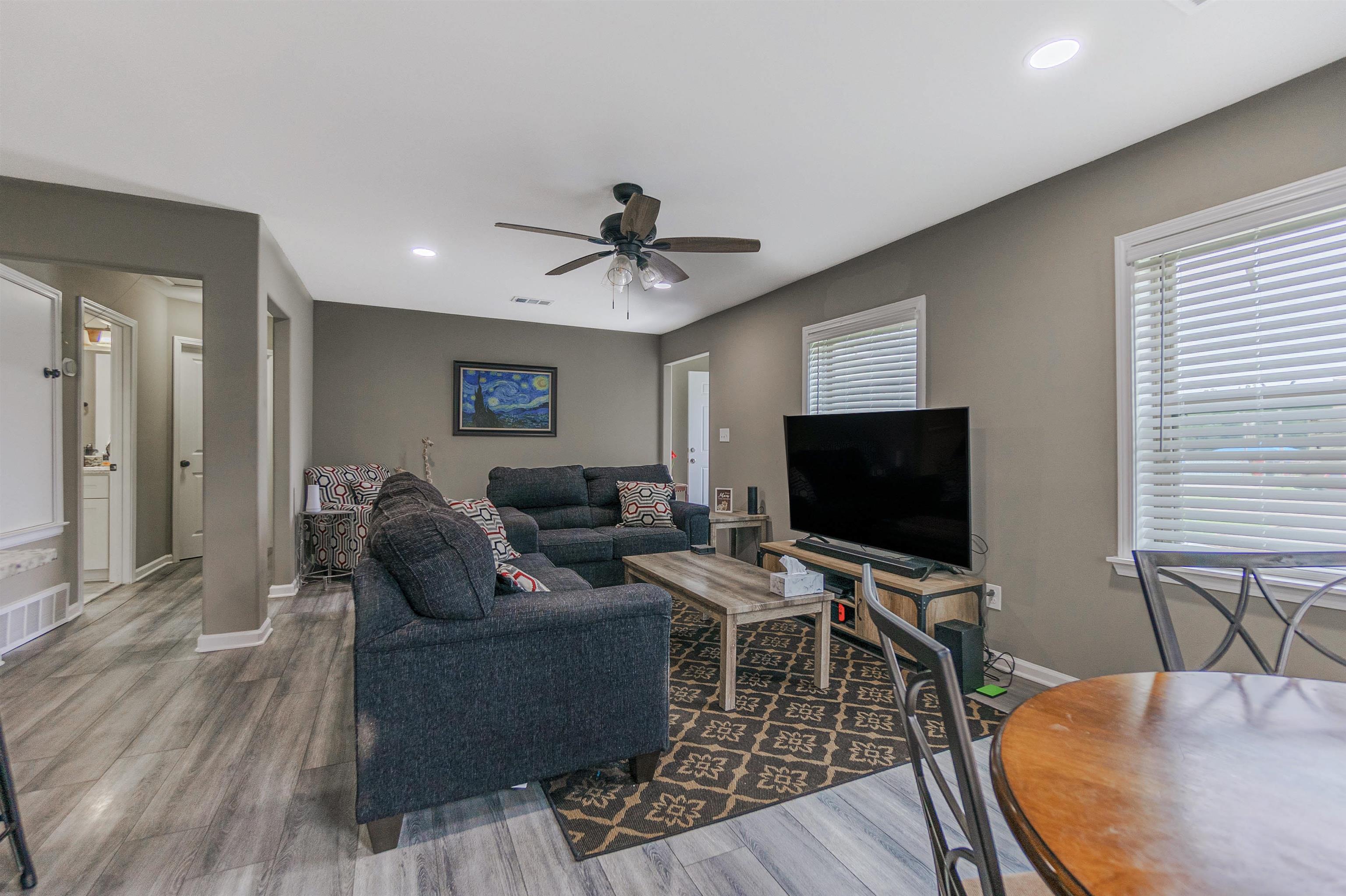3718 Vanuys Road Memphis, TN 38111 - Photo 4 of 20 a living room with furniture and a flat screen tv