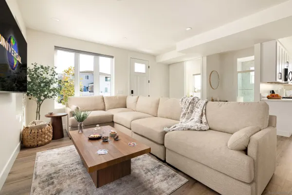 a living room with furniture or couch and a flat screen tv
