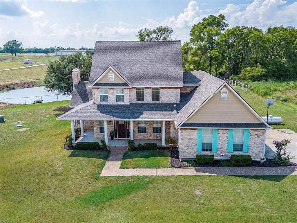 10200 Zipper Road Pilot Point, TX 76258 - Photo 2 of 18 an aerial view of a house with swimming pool yard and outdoor seating