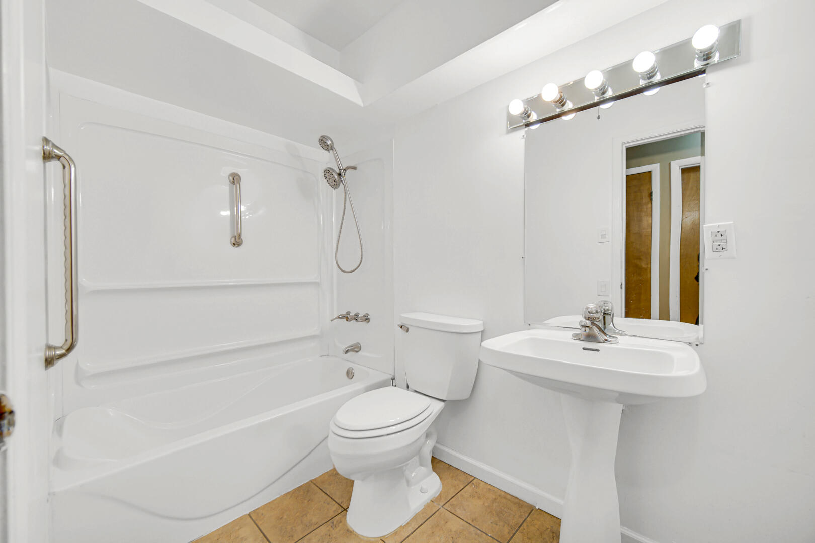 769-1 Juniper Road Valparaiso, IN 46385 - Photo 12 of 20 a bathroom with a sink toilet and shower