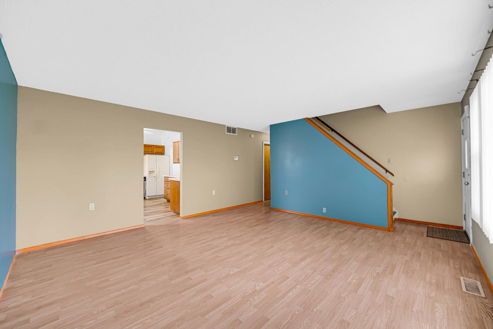 769-1 Juniper Road Valparaiso, IN 46385 - Photo 7 of 20 a view of an empty room with wooden floor