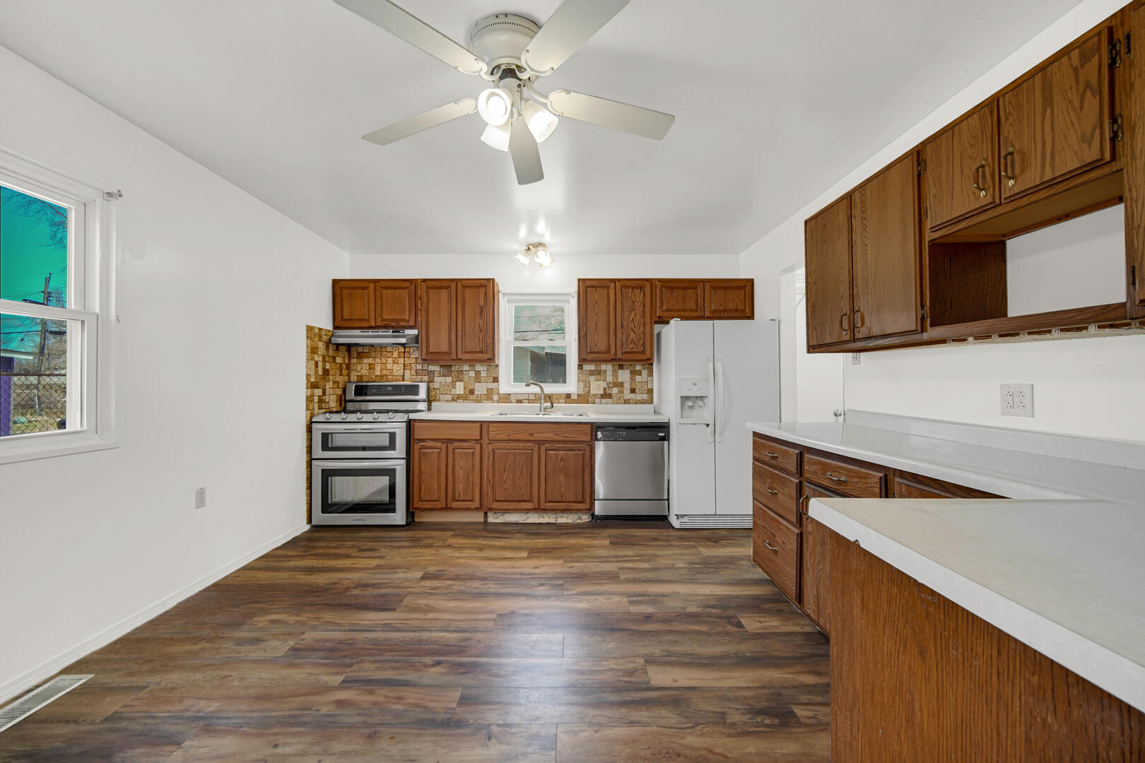 769-1 Juniper Road Valparaiso, IN 46385 - Photo 9 of 20 a kitchen with stainless steel appliances a stove microwave and cabinets