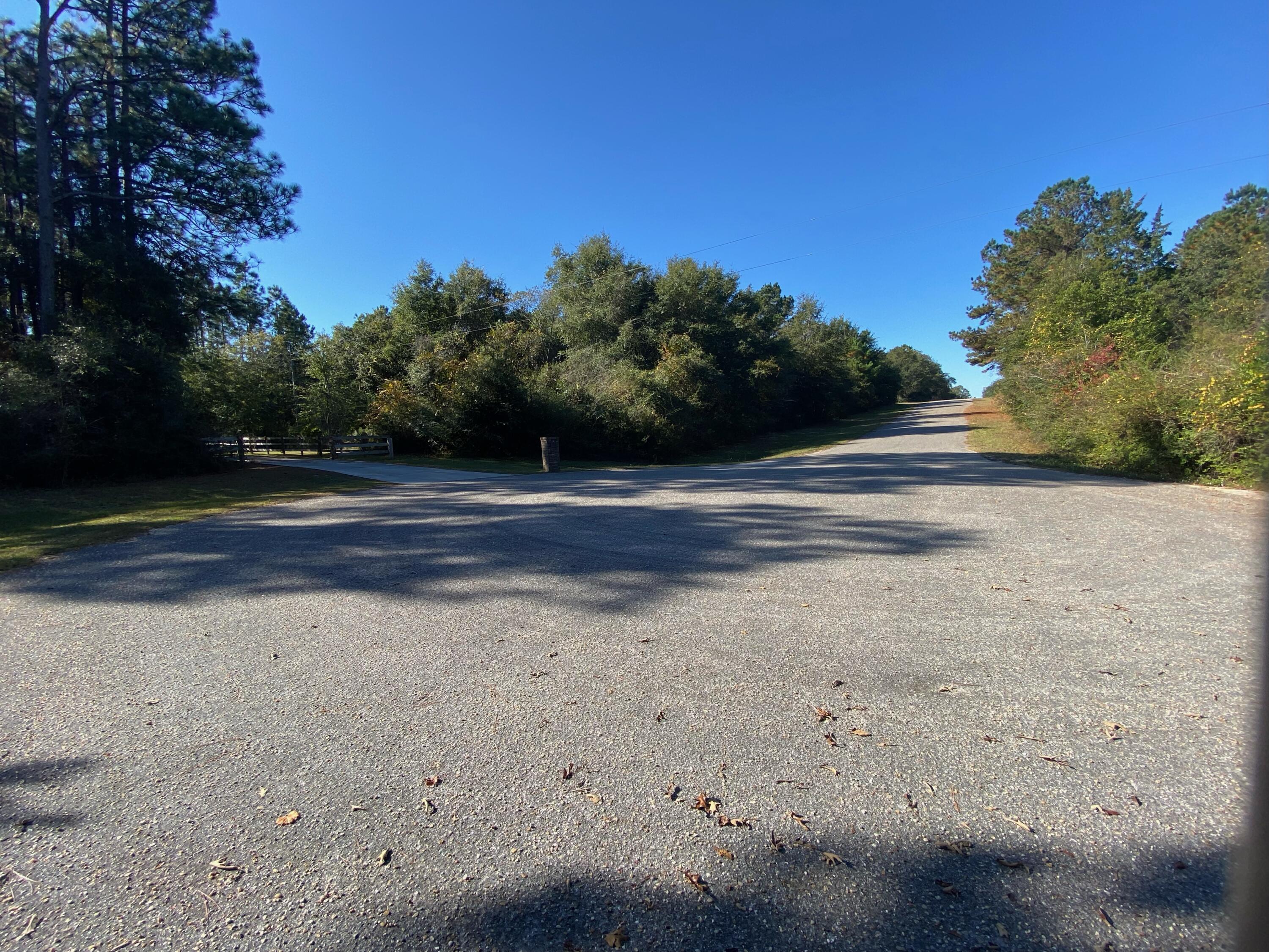 6595 Florida Avenue, Unit 155 Crestview, FL 32539 - Photo 6 of 11 a view of a yard with wooden fence