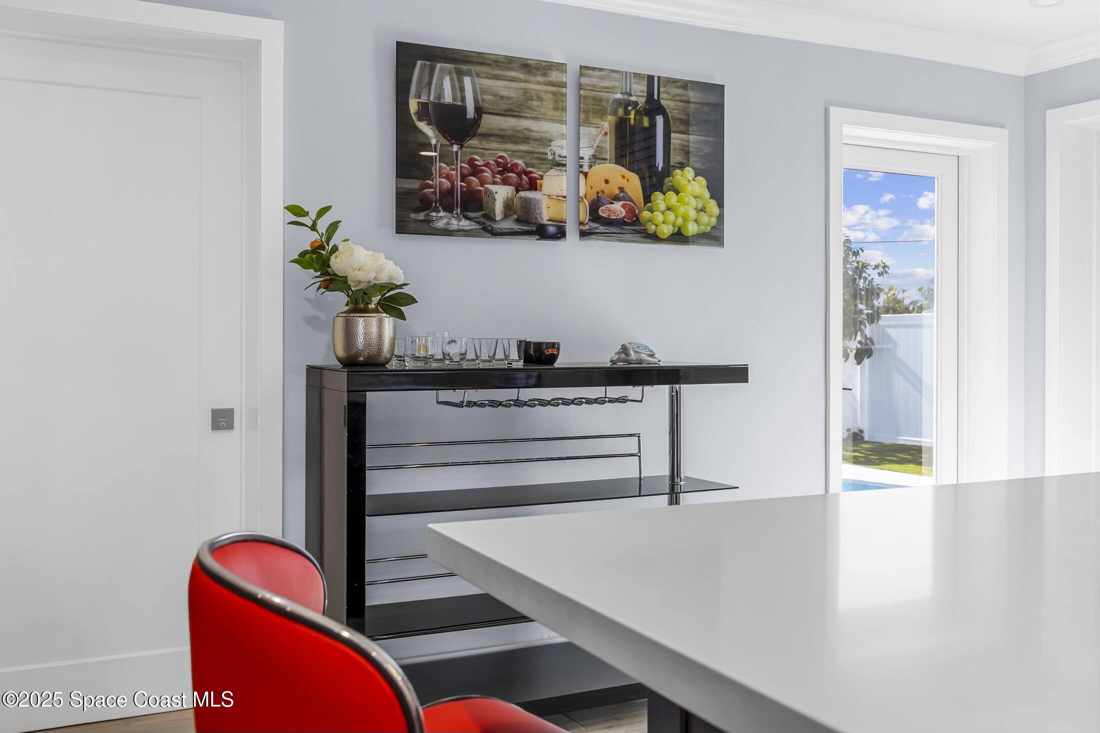 236 Northeast 3rd Street Satellite Beach, FL 32937 - Photo 6 of 22 a view of workspace with wooden floor