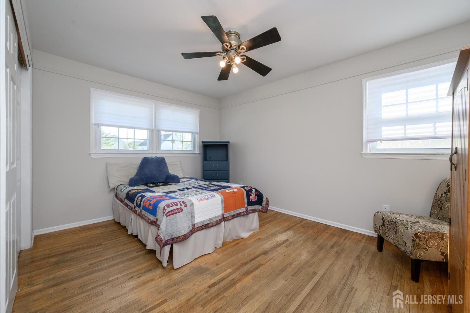 37 Helena Street East Brunswick, NJ 08816 - Photo 19 of 41 a bedroom with bed and a window