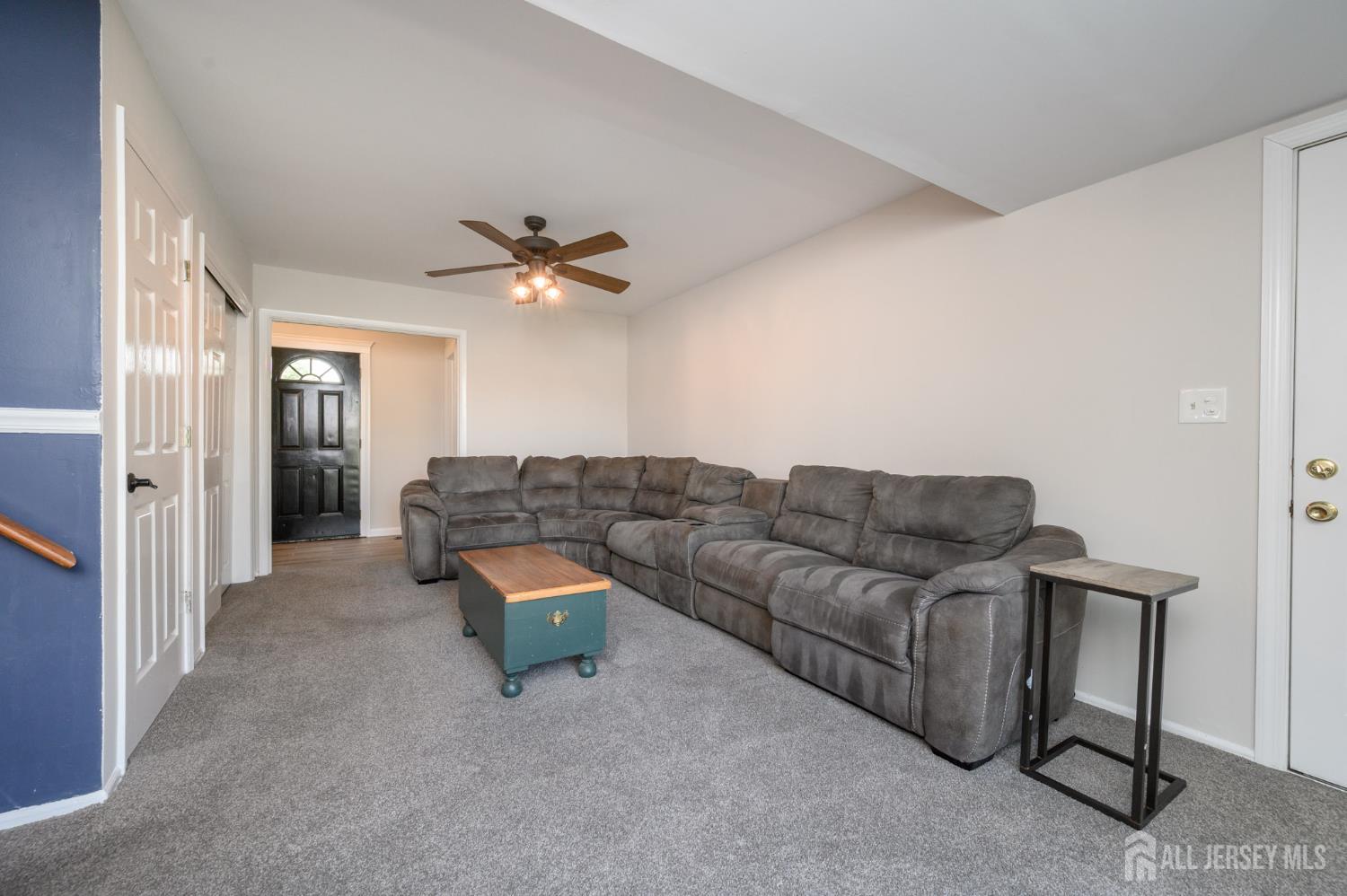37 Helena Street East Brunswick, NJ 08816 - Photo 25 of 41 a living room with furniture and a ceiling fan