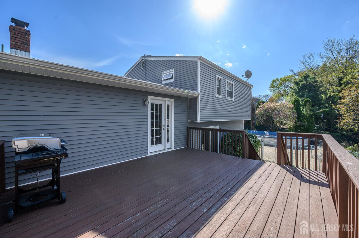 37 Helena Street East Brunswick, NJ 08816 - Photo 29 of 41 a view of a house with wooden deck