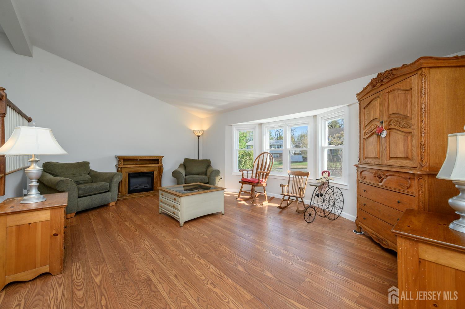 37 Helena Street East Brunswick, NJ 08816 - Photo 4 of 41 a living room with furniture and a fireplace