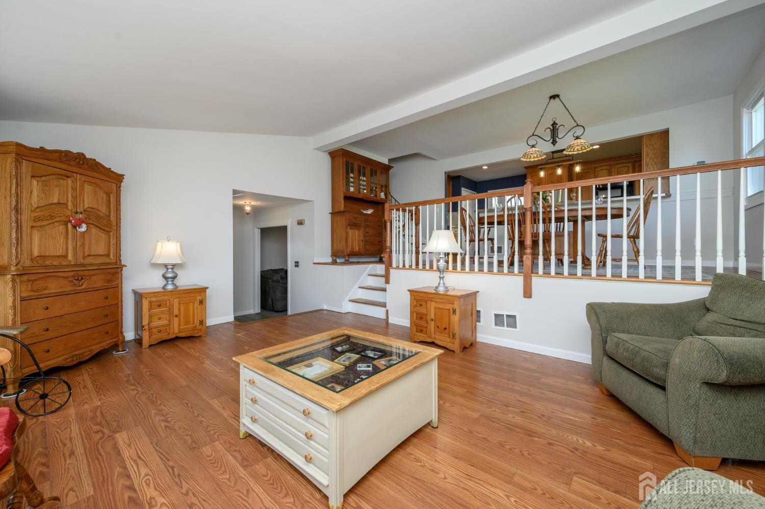 37 Helena Street East Brunswick, NJ 08816 - Photo 5 of 41 a living room with furniture and a wooden floor