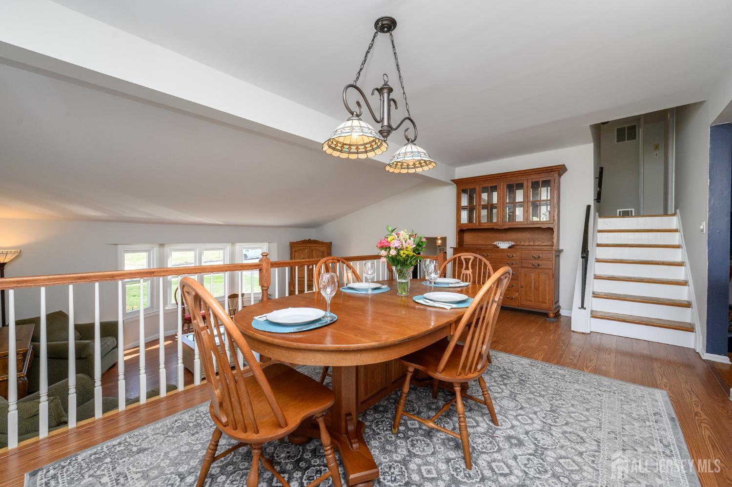 37 Helena Street East Brunswick, NJ 08816 - Photo 7 of 41 a dining room with furniture a rug and wooden floor
