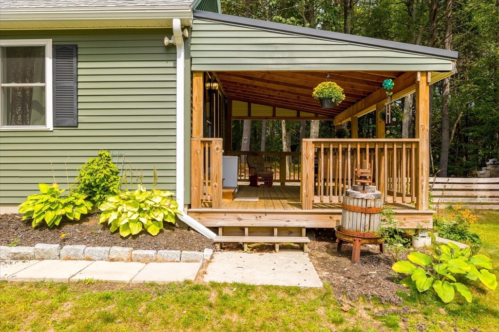 7 First Street Templeton, MA 01468 - Photo 3 of 35 a view of the patio with a bench
