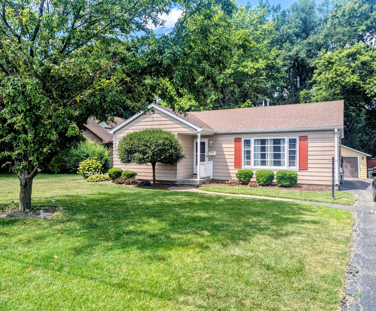 515 South Cedar Road New Lenox, IL 60451 - Photo 1 of 19 a front view of a house with a yard and trees