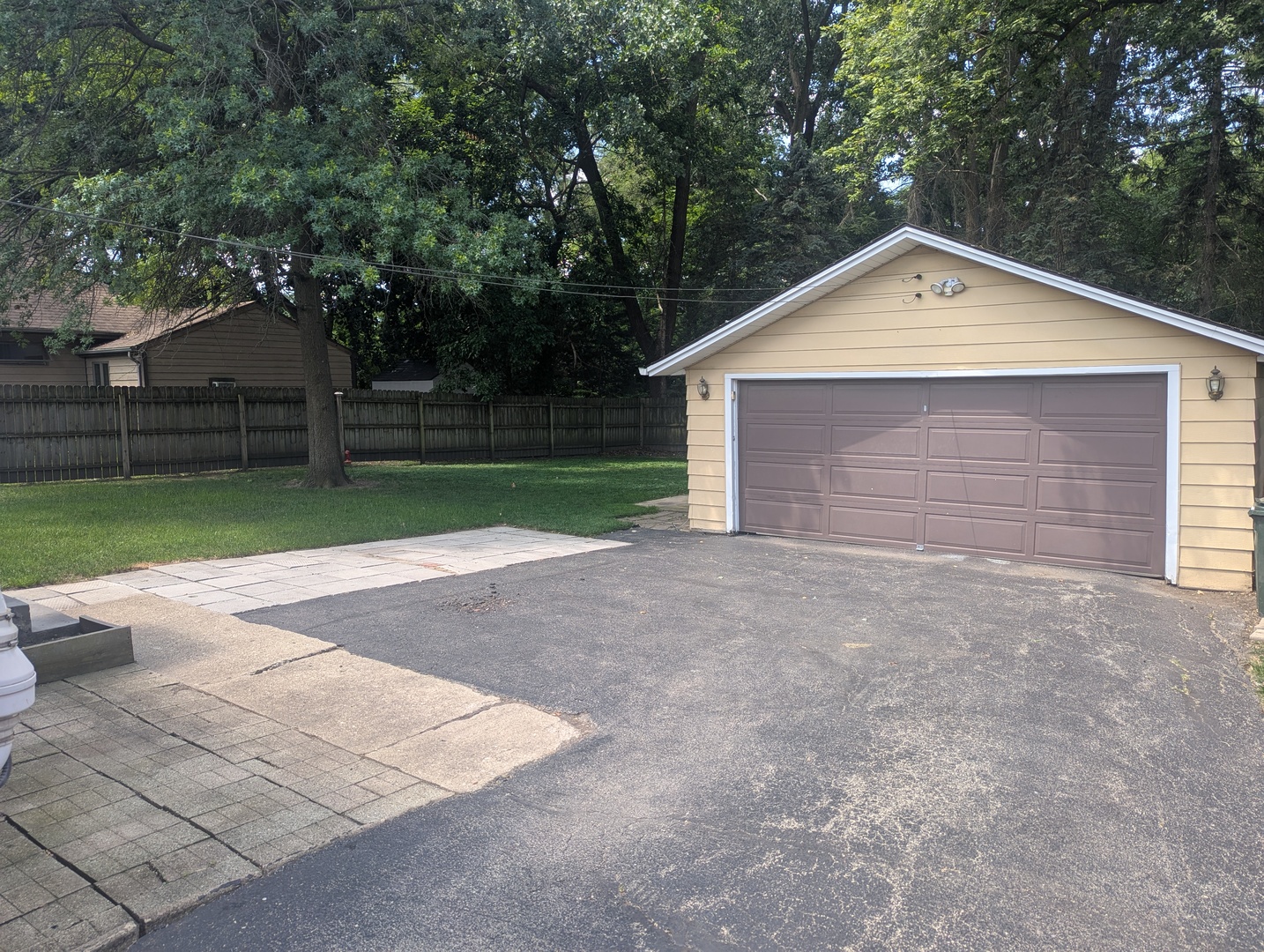 515 South Cedar Road New Lenox, IL 60451 - Photo 4 of 19 a view of backyard of house garage and trees